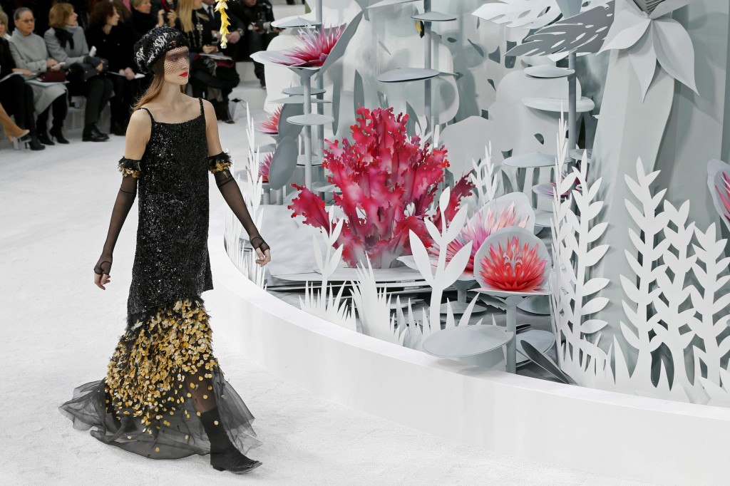 A model presents a creation by German designer Karl Lagerfeld as part of his Haute Couture Spring Summer 2015 fashion show for French fashion house Chanel in Paris